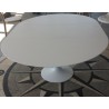 Re-edition of the round Tulip table in laminate