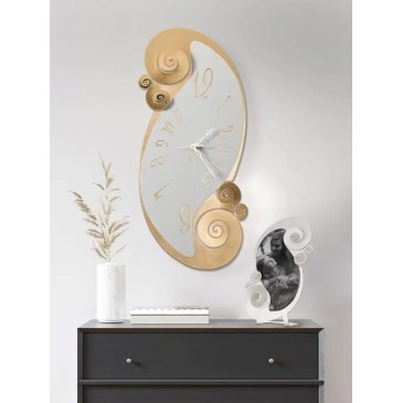 Circeo wall clock made of laser cut metal available in two different finishes