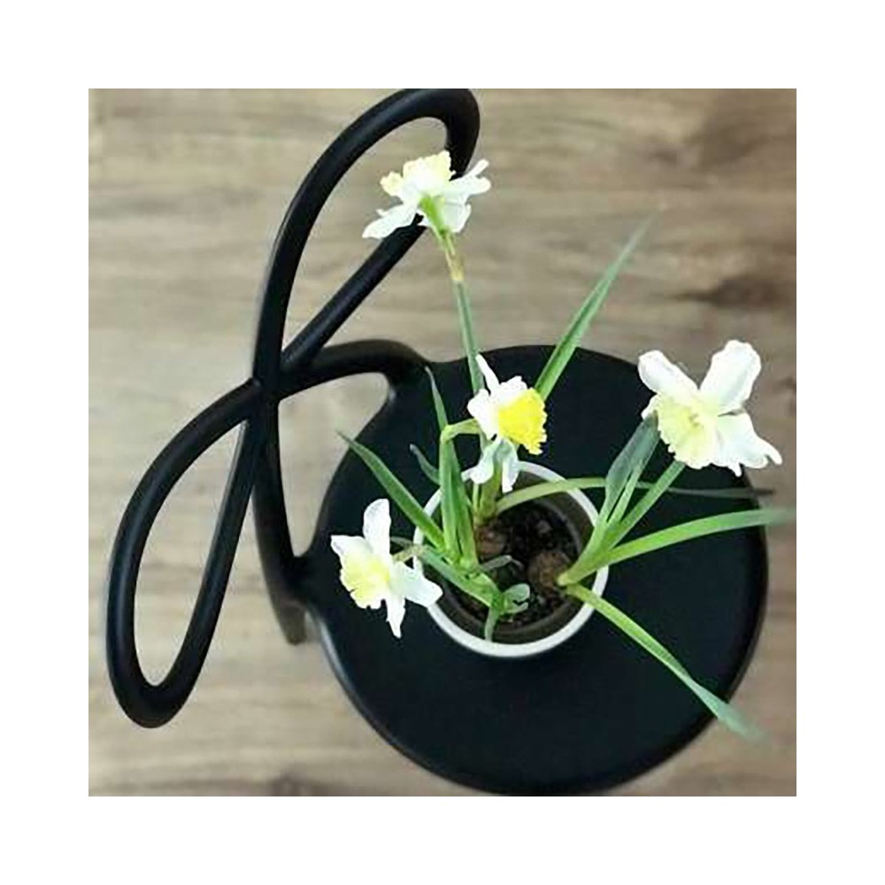 qeeboo ribbon chair black chair flowers