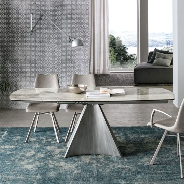Tornado extendable table by Target Point with metal structure and revolving top in porcelain stoneware