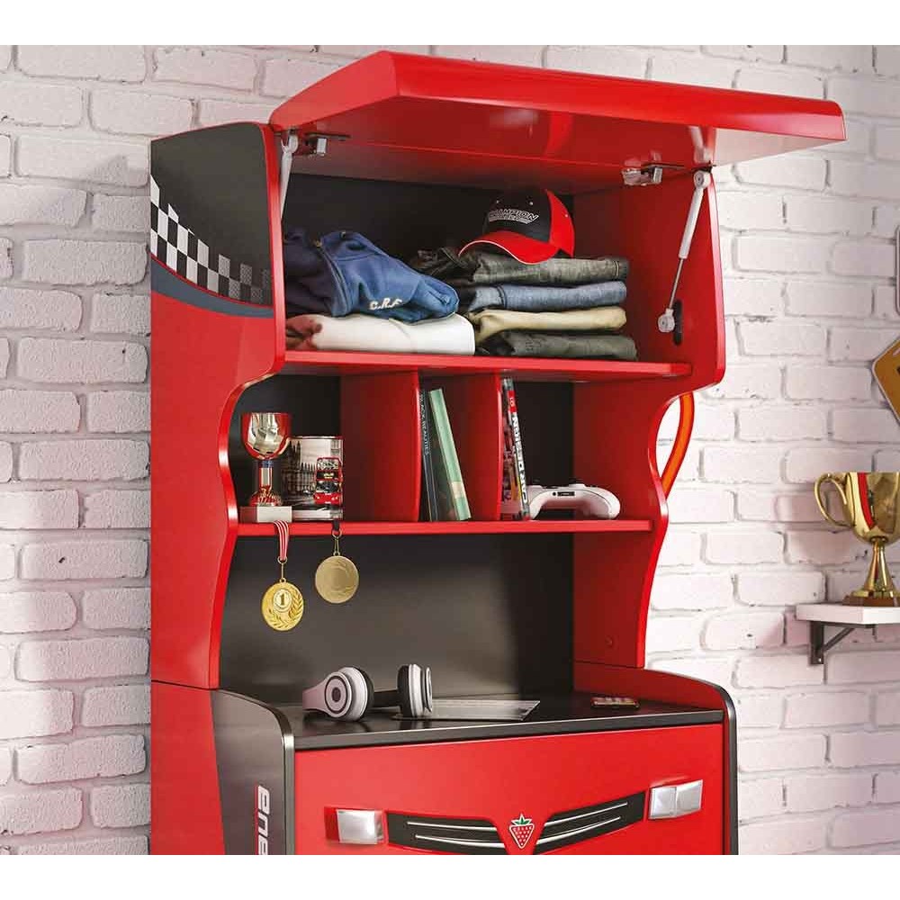 Dressoir en boekenkast in de vorm van een benzinepomp, kleur rood.