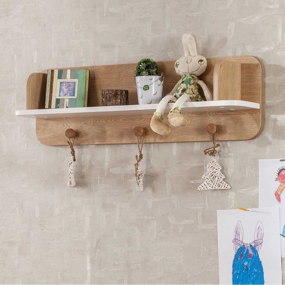 Shelf with 3 Babynatura coat hangers, ideal for children's room.