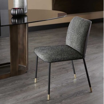 Oasi chair by Cantori made with metal frame and fabric upholstery