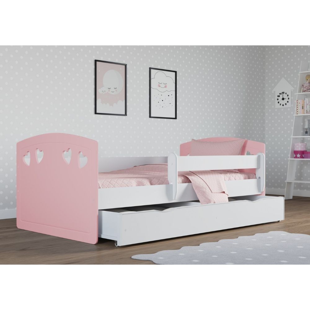 Julia Mix children's bed by Kocot pale pink and white mix in photo set with open chest of drawers