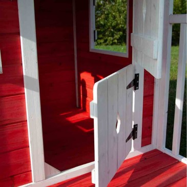 Anny di Losa wooden children's playhouse made of red-colored impregnated fir