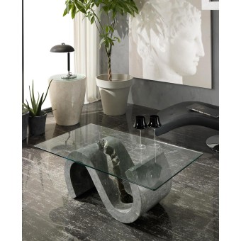 Flexus rooktafel met fossiel stenen onderstel en glazen blad geschikt voor studio's of appartementen.