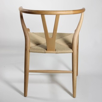 Re-edition of the Wishbon armchair by Hans J Wegner in birch wood