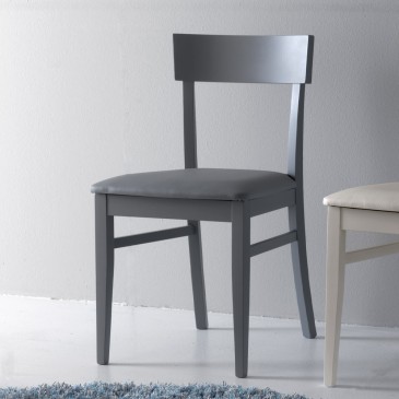 Chair in lacquered wood with eco-leather covering