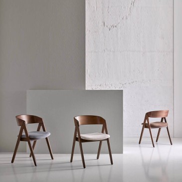 Oak wooden chairs in oak and walnut colors covered in fabric