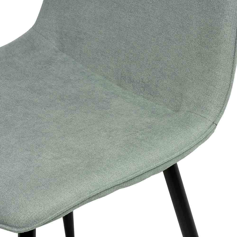 Padded chairs covered with metal leg structure