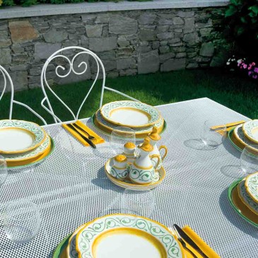 Outdoor table in ivory-coloured wrought iron