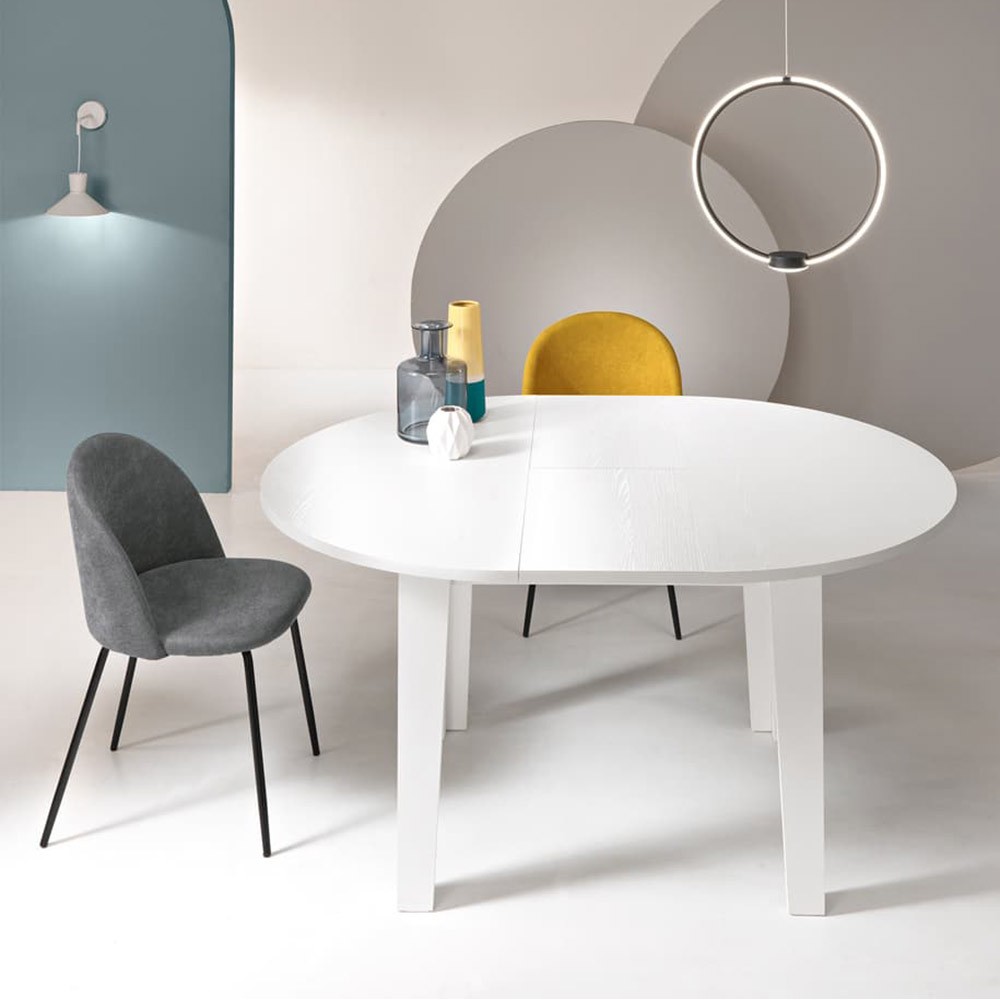 Modus extendable round table by Ikone Casa