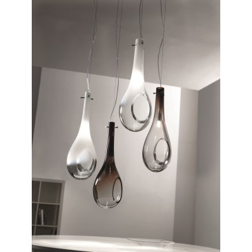 Drop suspension lamp in blown glass and then hand-ground in white or black