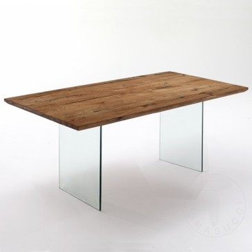 Mesa de jantar flutuante da Tomasucci com estrutura de vidro e tampo de madeira maciça
