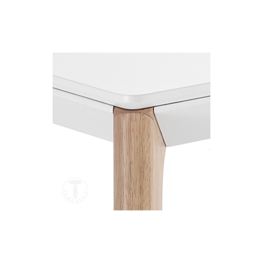 Varm extendable table by Tomasucci with solid oak-colored legs and top in matt white lacquered MDF