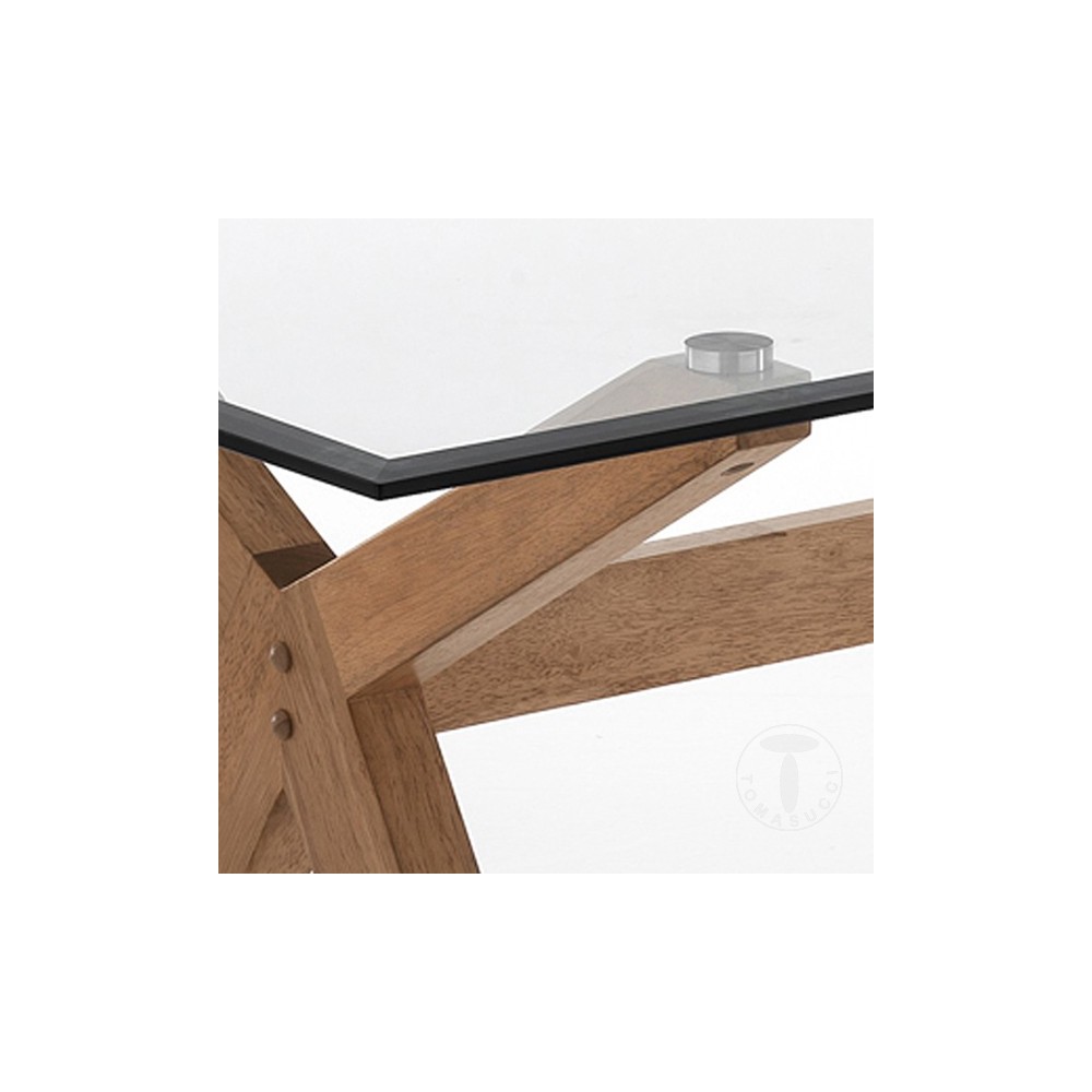 Table fixe Kyra-x de Tomasucci en bois massif et plateau en verre trempé fini avec meulage