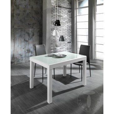 Lange witte allingable tafel van Tomasucci met wit metalen structuur en wit gelakt gehard glazen blad
