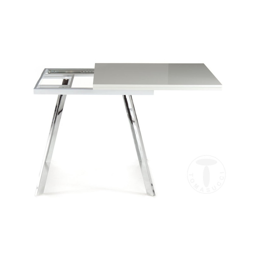 Riky uitschuifbare rechthoekige tafel van Tomasucci met verchroomd metalen frame en blad in glanzend wit gelakt MDF hout