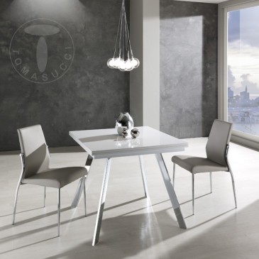 Riky extendable rectangular table by Tomasucci with chromed metal frame and top in glossy white lacquered MDF wood
