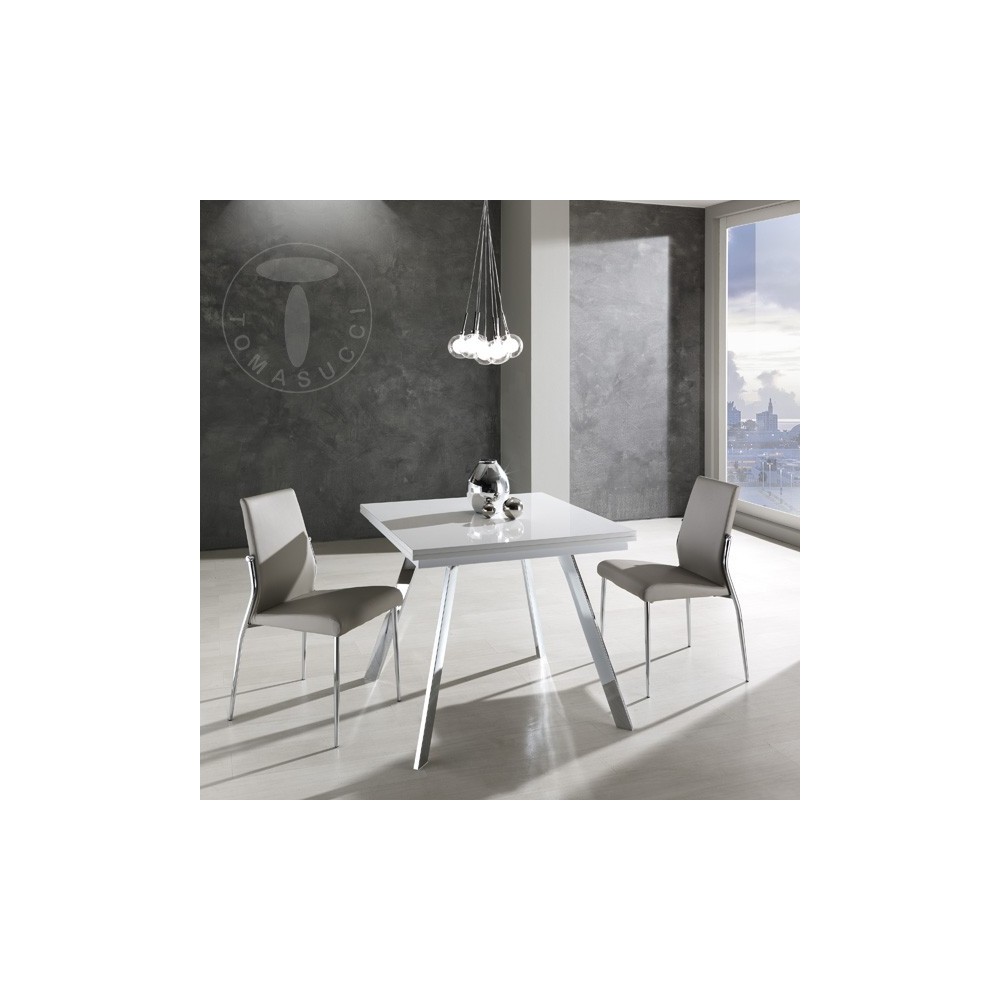 Tavolo rettangolare allungabile Riky di Tomasucci con struttura in metallo cromato e piano in legno MDF laccato bianco lucido