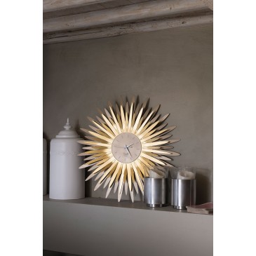 Sting wall clock by Arti e Mestieri in metal available in bronze and transparent gold finish