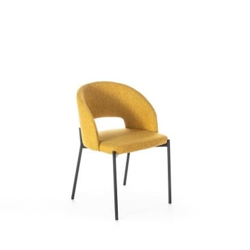 Greta chair by Stones with metal frame and seat covered in fabric
