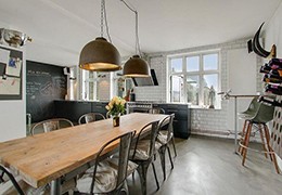 Furnishing the dining area with industrial and vintage style tables